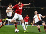 Phil Jones of Manchester United crosses the ball during the UEFA Champions League Group A match between Manchester United and Shakhtar Donetsk at Old Trafford on December 10, 2013