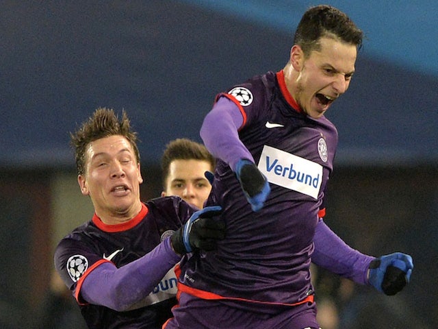Austria Wien forward Philipp Hosiner celebrates with Marko Stankovic after scoring during the UEFA Champions League group G football match against Zenit on December 11, 2013