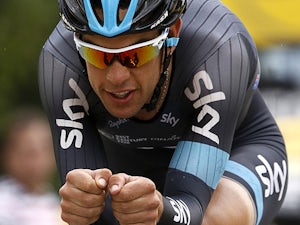 Australia's Richie Porte sprints before the finish line at the end of the 32 km individual time-trial and seventeenth stage of the 100th edition of the Tour de France cycling race on July 17, 2013