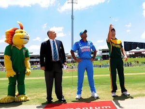 AB de Villiers of South Africa and MS Dhoni of India at the toss during the 3rd Momentum ODI match between South Africa and India at SuperSport Park on December 11, 2013