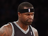 Stephen Jackson of the San Antonio Spurs leaves the court after being injured in the first quarter in the game against the New York Knicks on January 3, 2012