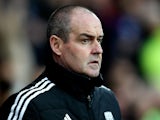 West Brom manager Steve Clarke looks on prior to the Premier League match between Cardiff City and West Bromwich Albion at Cardiff City Stadium on December 14, 2013