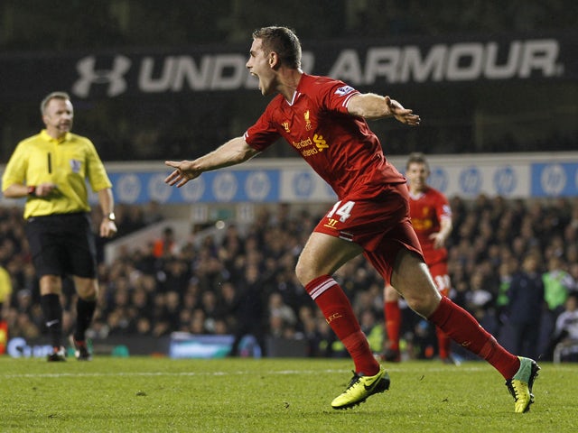Liverpool's English midfielder Jordan Henderson celebrates scoring a goal during the English Premier League football match between Tottenham Hotspur and Liverpool at White Hart Lane in London, England, on December 15, 2013