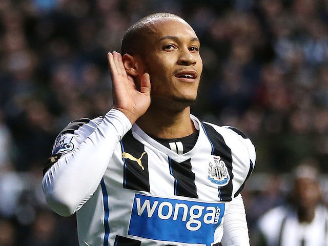 Newcastle United's French striker Yoan Gouffran celebrates scoring the opening goal during the English Premier League football match between Newcastle United and Southampton at St James' Park on December 14, 2013