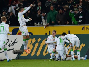 Monchengladbach, Wolfsburg share four goals