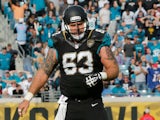 Brad Meester #63 of the Jacksonville Jaguars in action during the game at EverBank Field on December 15, 2013