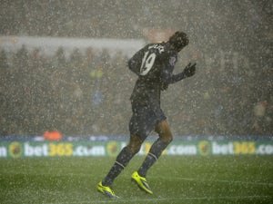 Torrential hail temporarily halts Stoke, United