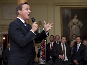 Prime Minister David Cameron speaks during an official reception at Downing Street on September 16, 2013