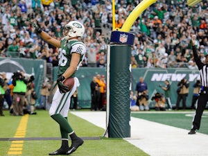 Wide receiver David Nelson of the New York Jets celebrates his touchdown catch during the first half against the Cleveland Browns at MetLife Stadium on December 22, 2013