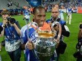Didier Drogba poses with the Champions League trophy on May 19, 2012.