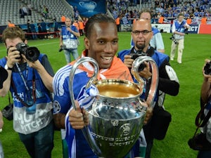 Didier Drogba poses with the Champions League trophy on May 19, 2012.