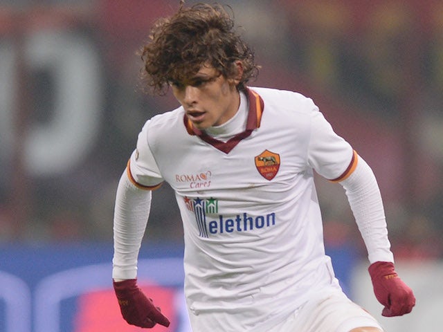 Dodo of AS Roma in action during the Serie A match between AC Milan and AS Roma at San Siro Stadium on December 16, 2013