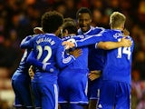 Chelsea's Frank Lampard celebrates with teammates after scoring the opening goal against Sunderland during their Capital One Cup quarter-final match on December 17, 2013 