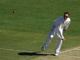 Graeme Swann of England bowls during day one of the First Ashes Test match between Australia and England at The Gabba on November 21, 2013