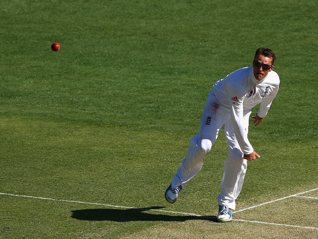 Graeme Swann of England bowls during day one of the First Ashes Test match between Australia and England at The Gabba on November 21, 2013