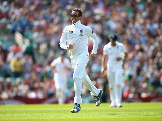 Graeme Swann of England celebrates after taking the wicket of Shane Watson of Australia during day five of the 5th Investec Ashes Test match between England and Australia at the Kia Oval on August 25, 2013