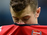 Arsenal's English midfielder Jack Wilshere reacts at the final whistle after his team were beaten 6-3 during the English Premier League football match between Manchester City and Arsenal at the Etihad Stadium in Manchester, northwest England, on December 