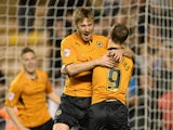James Henry of Wolves celebrates scoring the first goal with team mate Leigh Griffiths during the Sky Bet League One match between Wolverhampton Wanderers and Oldham Athletic at Molineux on October 22, 2013
