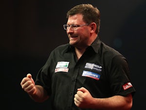 Wade, Chisnall into round two