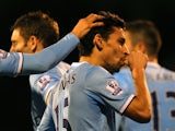 Jesus Navas of Manchester City celebrates scoring their third goal during the Barclays Premier League match between Fulham and Manchester City at Craven Cottage on December 21, 2013