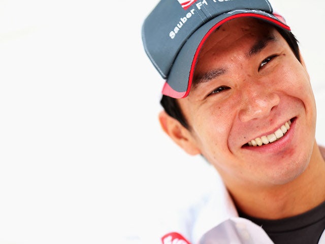 Kamui Kobayashi of Japan and Sauber F1 is seen outside his team hospitaly unit during previews for the Brazilian Formula One Grand Prix on November 22, 2013