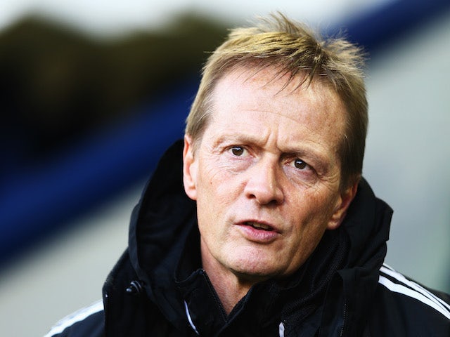  West Bromwich Albion caretaker manager Keith Downing looks on before the Barclays Premier League match between West Bromwich Albion and Hull City on December 21, 2013