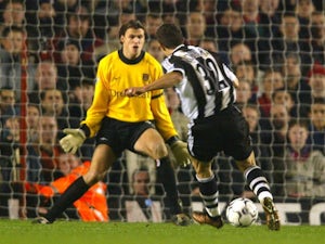 Laurent Robert scores Newcastle United's third goal against Arsenal on December 18, 2001.