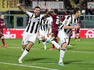Thomas Heurtaux of Udinese Calcio celebrates after scoring a goal during the Serie A match between AS Livorno Calcio and Udinese Calcio at Stadio Armando Picchi on December 22, 2013