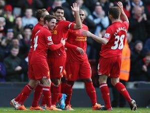 Suarez scores twice in Liverpool win
