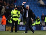 Manchester City manager Mark Hughes waves to the crowd after the Barclays Premier League match between Manchester City and Sunderland at the City of Manchester Stadium on December 19, 2009