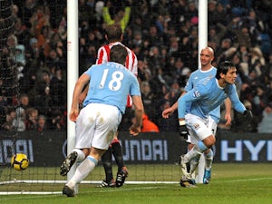 Manchester City's Paraguayan striker Roque Santa Cruz celebrates his goal during the English Premier League football match between Manchester City and Sunderland at the City Of Manchester Stadium in Manchester, north-west England on December 19, 2009