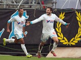 Marseille's French forward Andre-Pierre Gignac celebrates after scoring during the French L1 football match Olympique de Marseille vs Bordeaux on December 22, 2013 