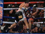 Ruslan Provodnikov of Russia knocks down Mike Alvarado on the ropes in the eighth round at the 1stBank Center on October 19, 2013