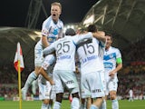 Mitch Nichols of the Victory is congratulated by his teammates after scoring his second goal during the round 11 A-League match against Melbourne Heart on December 21, 2013
