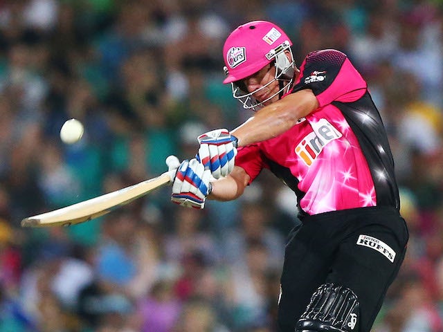 Moises Henriques of the Sixers hits for six during the Big Bash League match between the Sydney Sixers and Sydney Thunder at SCG on December 21, 2013