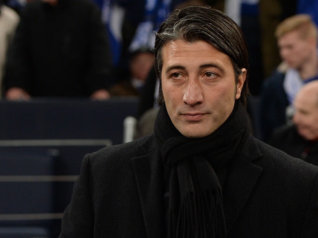 Basel's head coach Murat Yakin is pictured prior to the UEFA Champions League group E football match FC Schalke 04 vs FC Basel 1893 in Gelsenkirchen, western Germany, on December 11, 2013