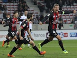 Nice's Serbia defender and captain Nemanja Pejcinovic celebrates after scoring a goal during the French Ligue Cup football match between Nice (OGCN) and Sochaux (FCSM), on December 18, 2013