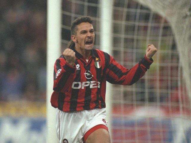 Roberto Baggio celebrates scoring for AC Milan against Inter Milan on November 24, 1996.