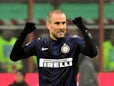 Inter Milan's Argentinian forward Rodrigo Palacio celebrates after scoring during the Italian Serie A football match Inter Milan vs AC Milan at San Siro Stadium in Milan on December 22, 2013