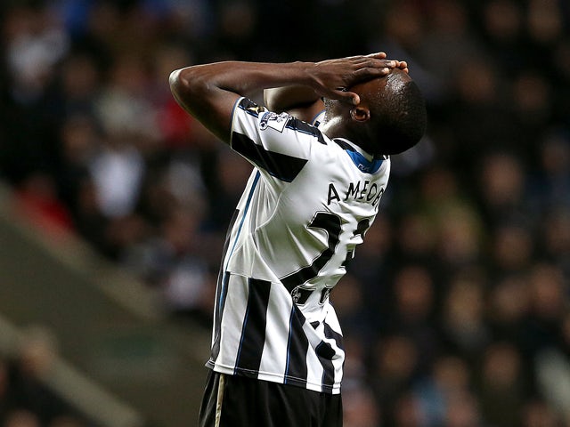 Newcastle United's Nigerian striker Shola Ameobi reacts to a miss in goal during the English Premier League football match between Newcastle United and West Bromwich Albion at St James' Park in Newcastle upon Tyne on November 30, 2013