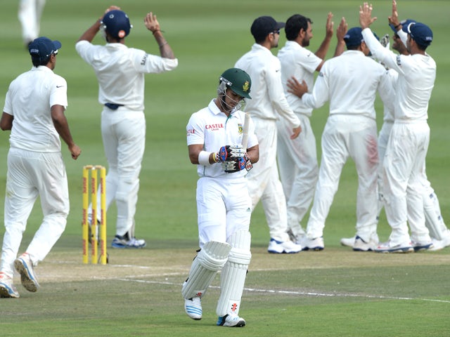 JP Duminy of South Africa dismissed for 2 runs during day 2 of the 1st Test match between South Africa and India at Bidvest Wanderers Stadium on December 19, 2013