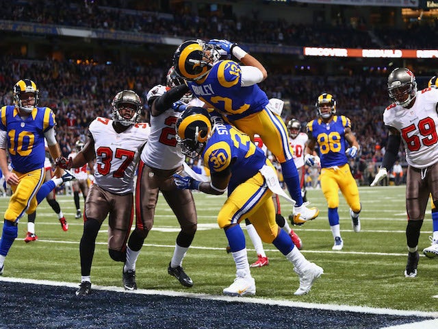 Stedman Bailey of the St. Louis Rams scores a touchdown against the Tampa Bay Buccaneers at the Edward Jones Dome on December 22, 2013