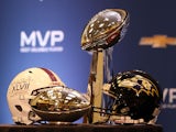 Detail of the MVP and Super Bowl trophies during the Super Bowl XLVII Team Winning Coach and MVP Press Conference at the Ernest N. Morial Convention Center on February 4, 2013