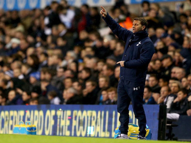 Tim Sherwood interim manager of Tottenham Hotspur gives instructions during the Capital One Cup Quarter-Final match between Tottenham Hotspur and West Ham United on December 18, 2013