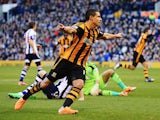 Jake Livermore of Hull City shoots celebrates scoring during the Barclays Premier League match between West Bromwich Albion and Hull City at The Hawthorns on December 21, 2013