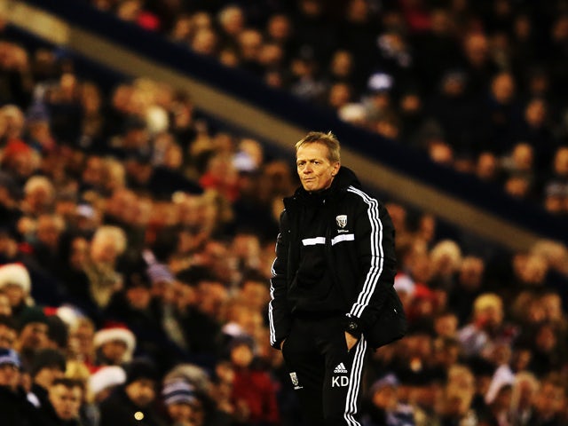 West Bromwich Albion caretaker manager Keith Downing reacts on the touchline during the Barclays Premier League match between West Bromwich Albion and Hull City at The Hawthorns on December 21, 2013