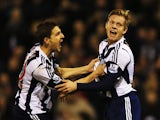Matej Vydra of West Bromwich Albion celebrates with team mate Zoltan Gera after scoring during the Barclays Premier League match between West Bromwich Albion and Hull City at The Hawthorns on December 21, 2013