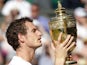 Andy Murray celebrates with the Wimbledon trophy on July 07, 2013.