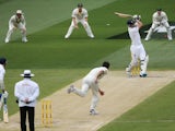 Mitchell Johnson of Australia bowls out Kevin Pietersen of England during day two of the Fourth Ashes Test Match between Australia and England at Melbourne Cricket Ground on December 27, 2013