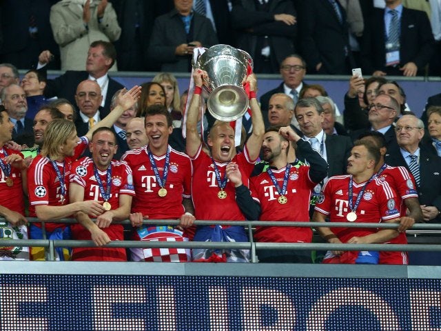 Bayern Munich celebrate with the Champions League trophy on May 25, 2013.
